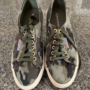 Size 8.5 camouflage sneakers.  Like new, worn.